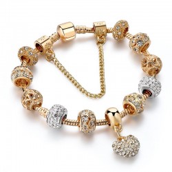PulseraLuxurious gold bracelet - with crystal beads / heart