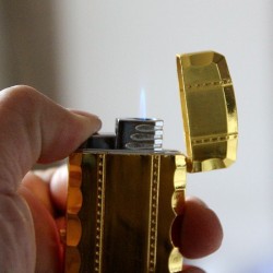 Butane jet cigarette lighter - quartz clock - torchLighters