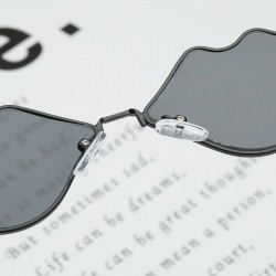 Lips shaped sunglasses with a metal frameSunglasses